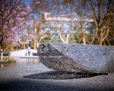 高鐵站云林景觀功能性鏤空樹(shù)葉座椅不銹鋼雕塑定制